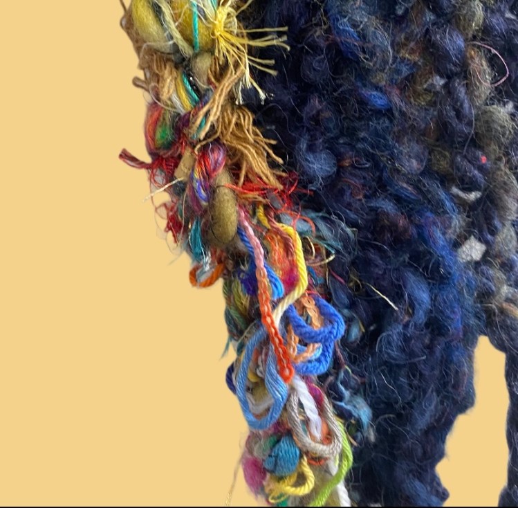 hand soon yarn shawl close up 