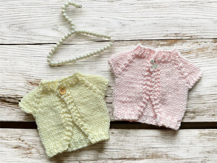 pink and cream chunky baby cardigans for a knitting pattern 